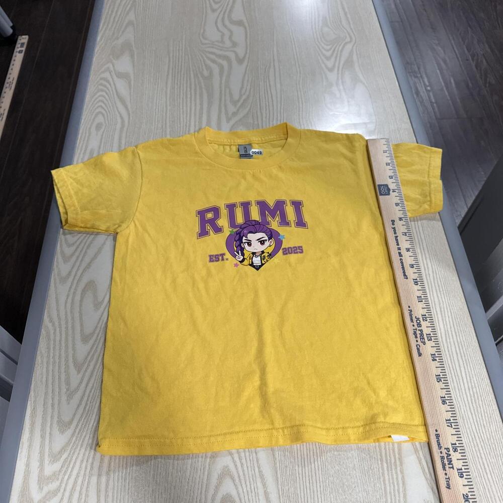 Yellow Rumi graphic tee with purple text and cartoon character #anime #graphic #